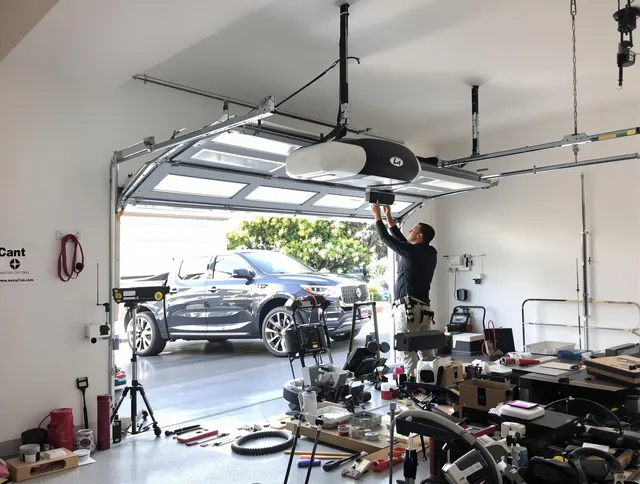 Lewisboro Garage Door Repair specialist installing smart garage door opener system in Lewisboro home