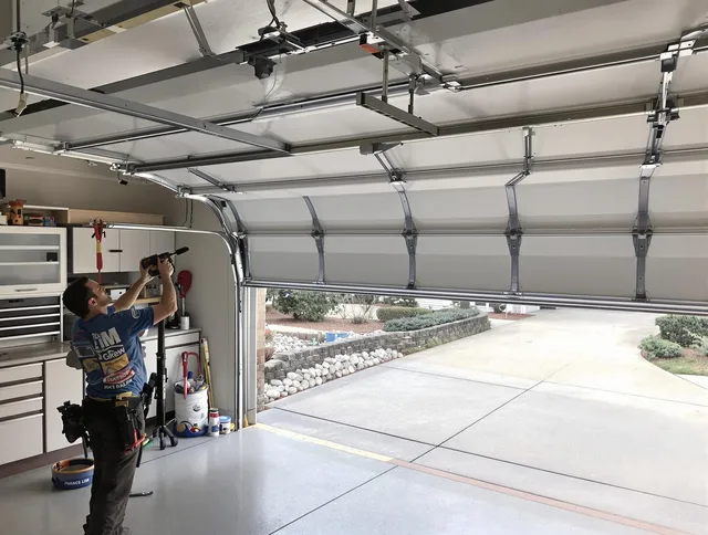 Garage door track repair service by Lewisboro Garage Door Repair in Lewisboro